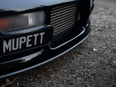 Detailed view of front lip styling on R33 M-Spec Skyline bumper