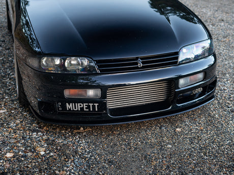Nissan R33 Skyline featuring Project Aero’s M-Spec front lip in black
