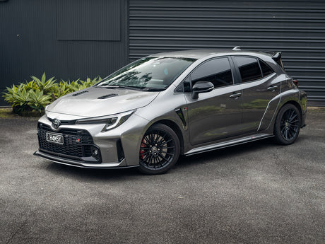 Parked GR Corolla with the full lip kit enhancing visual presence.