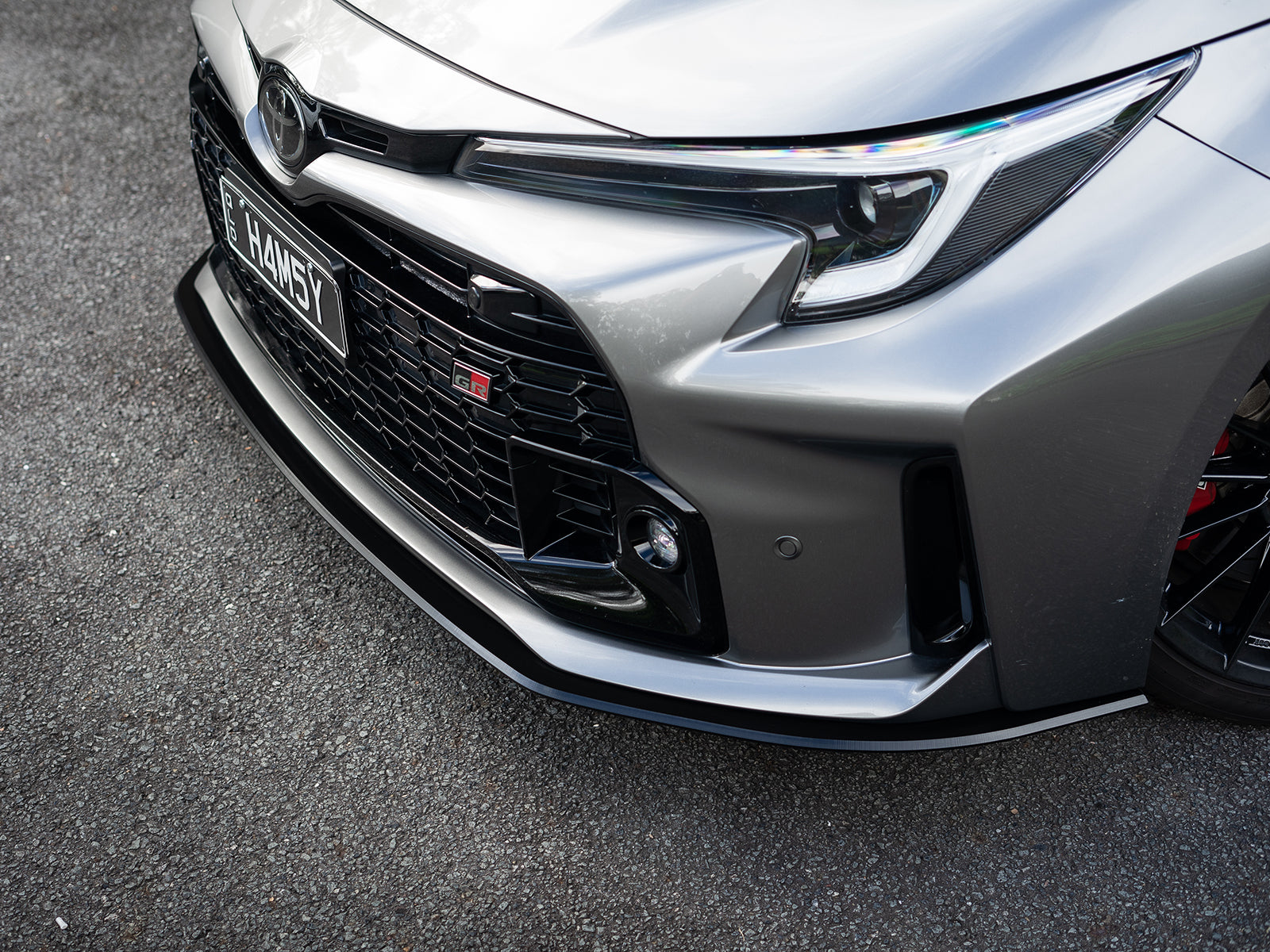 Overhead angle of GR Corolla with front splitter lip installed.