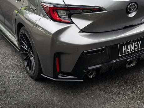 Split angle shot showing cohesive flow of the splitter kit from front to rear.