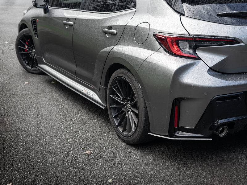 Rear corner shot of GR Corolla featuring full splitter kit components.