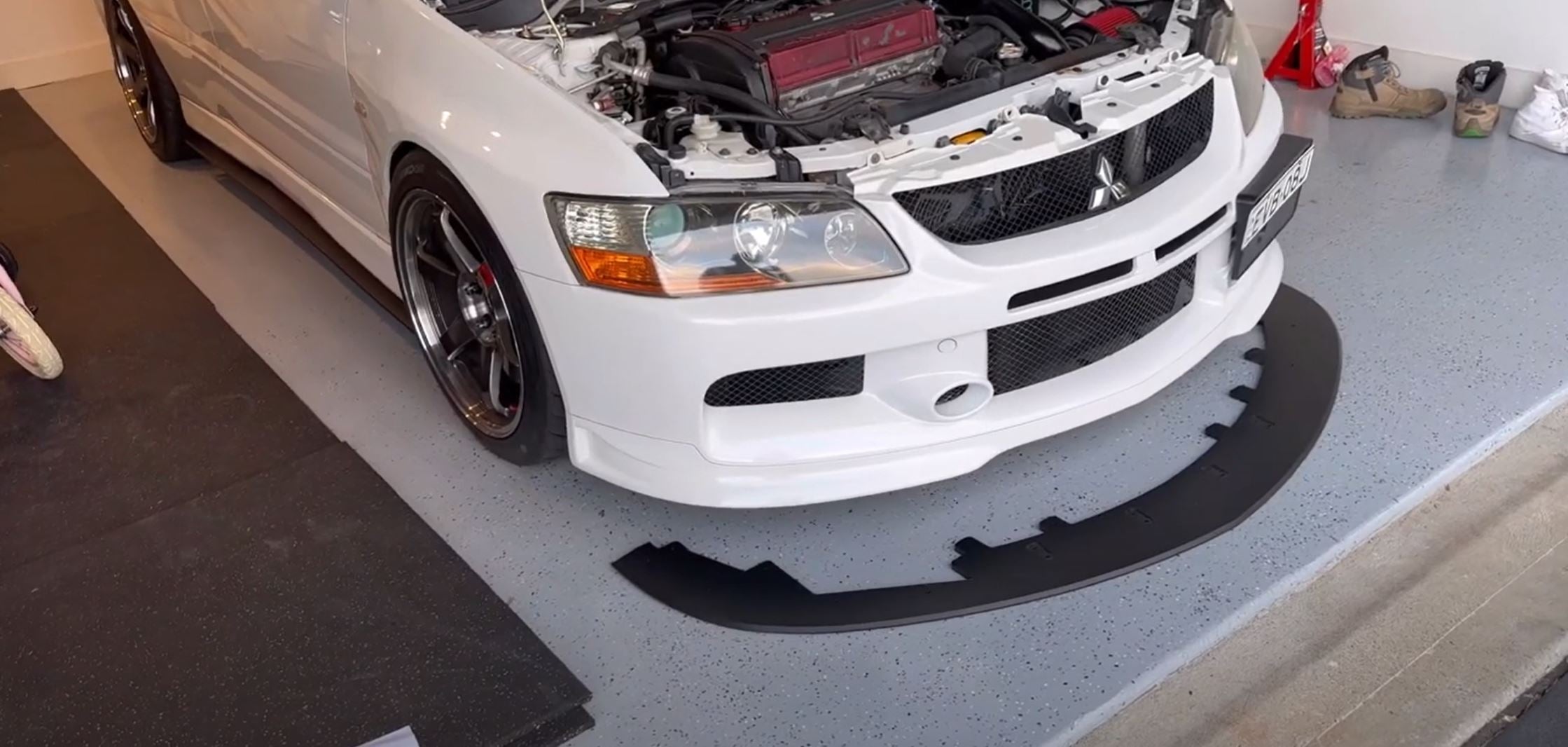 Load video: How to install the Evo 9 Front Splitter Lip