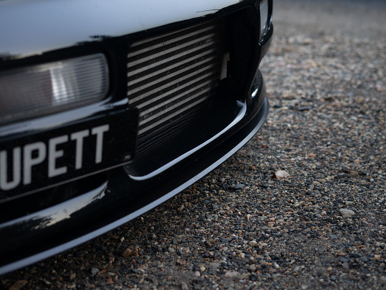 Perfect fitment of Project Aero front lip on 90s era R33 Nissan Skyline
