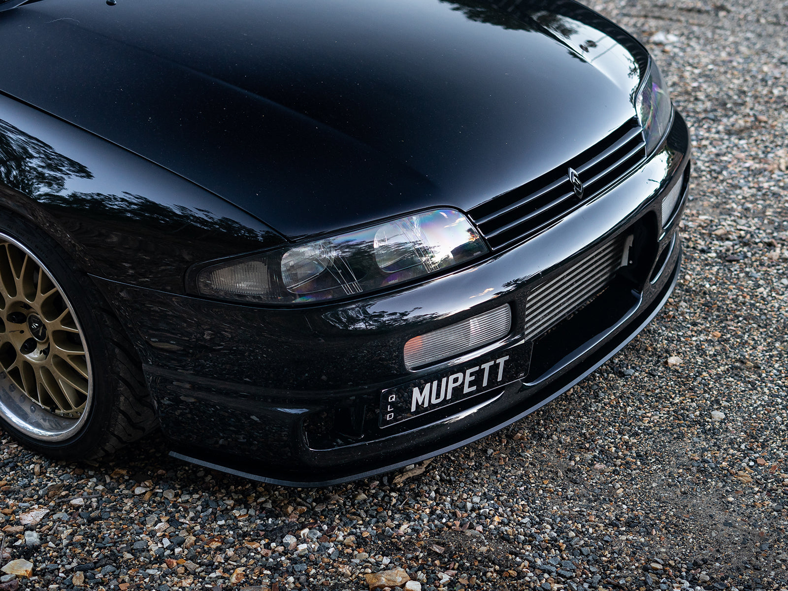 Project Aero front lip installed on Nissan Skyline R33 M-Spec bumper
