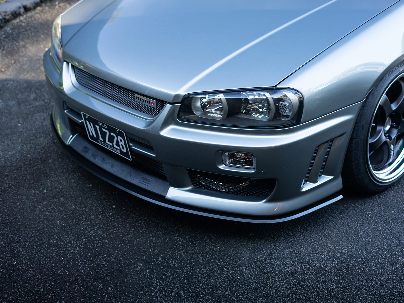 Project Aero front splitter for R34 Skyline, showcasing design contours and fitment detail