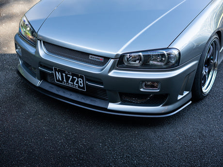 Project Aero front splitter for R34 Skyline, showcasing design contours and fitment detail