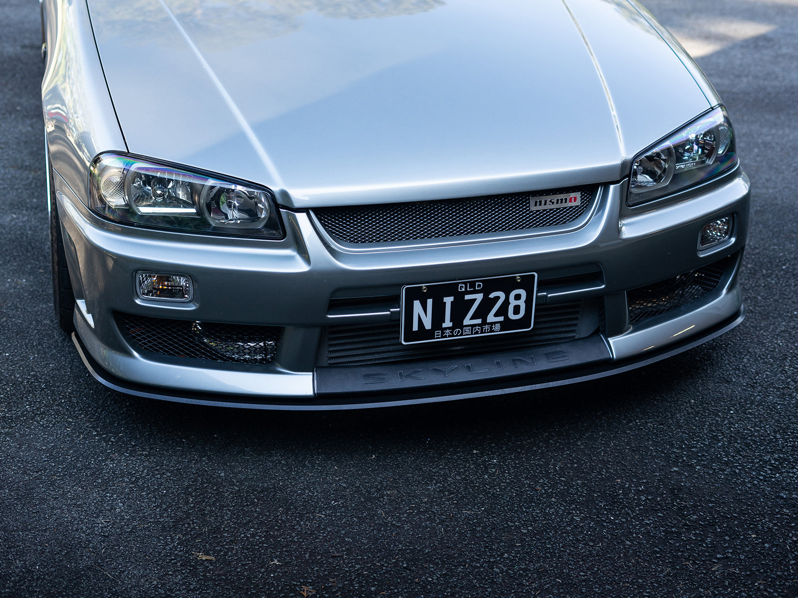 Project Aero front splitter for R34 Skyline, showcasing design contours and fitment detail