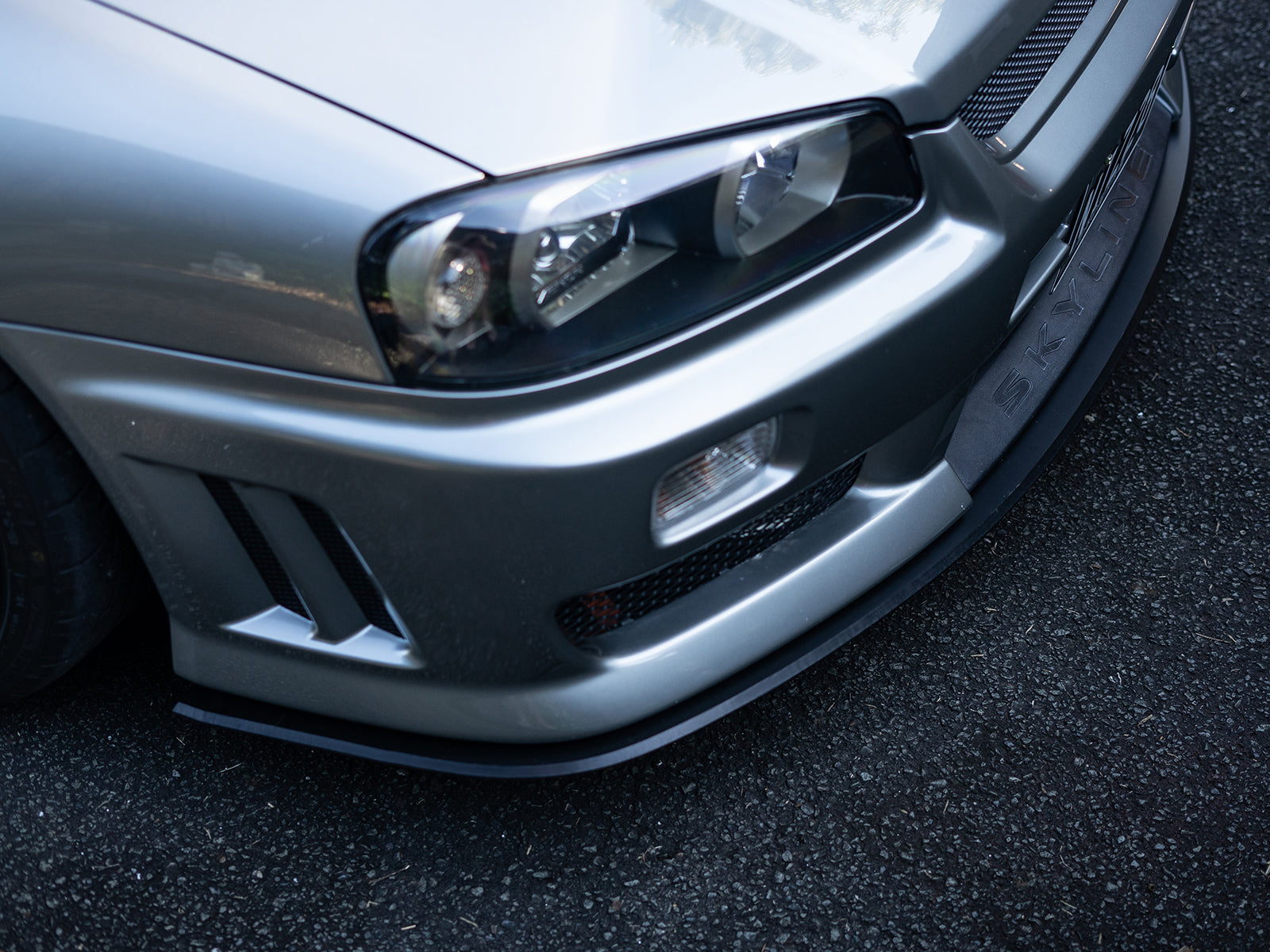 Project Aero Altia front lip for R34 Skyline – designed for OEM fitment and clean styling