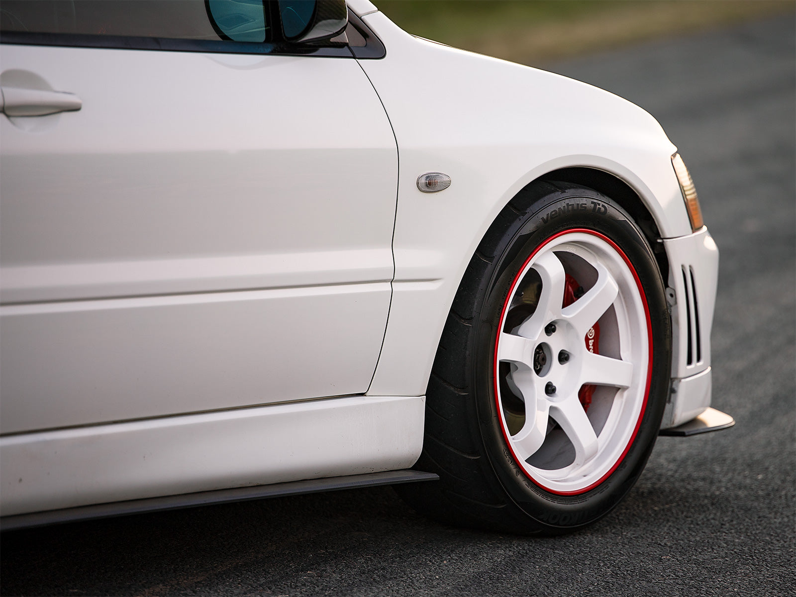 The complete Mitsubishi Evo 7 Splitter Lip Kit is a perfect addition to any Evo 7. Stylish and unique in design.