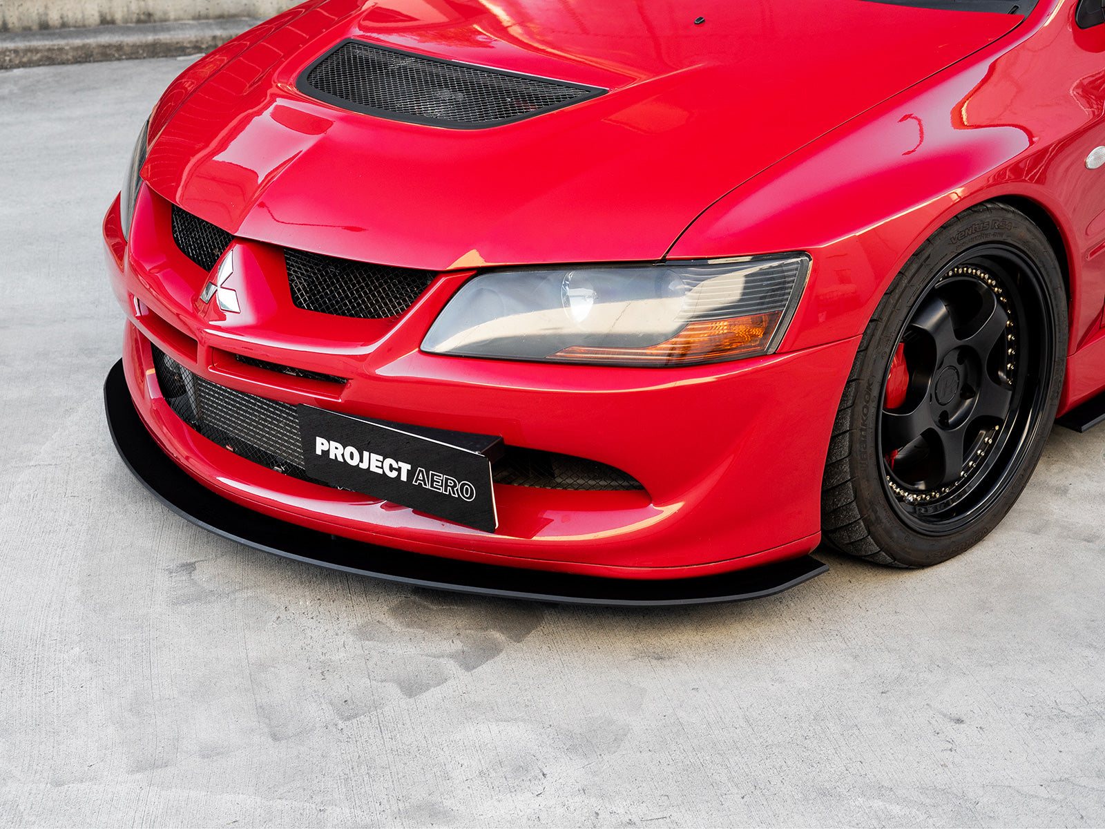 Project Aero Mitsubishi Evo 8 Front Splitter Lip, subtle in design complimenting the OEM original bumper.