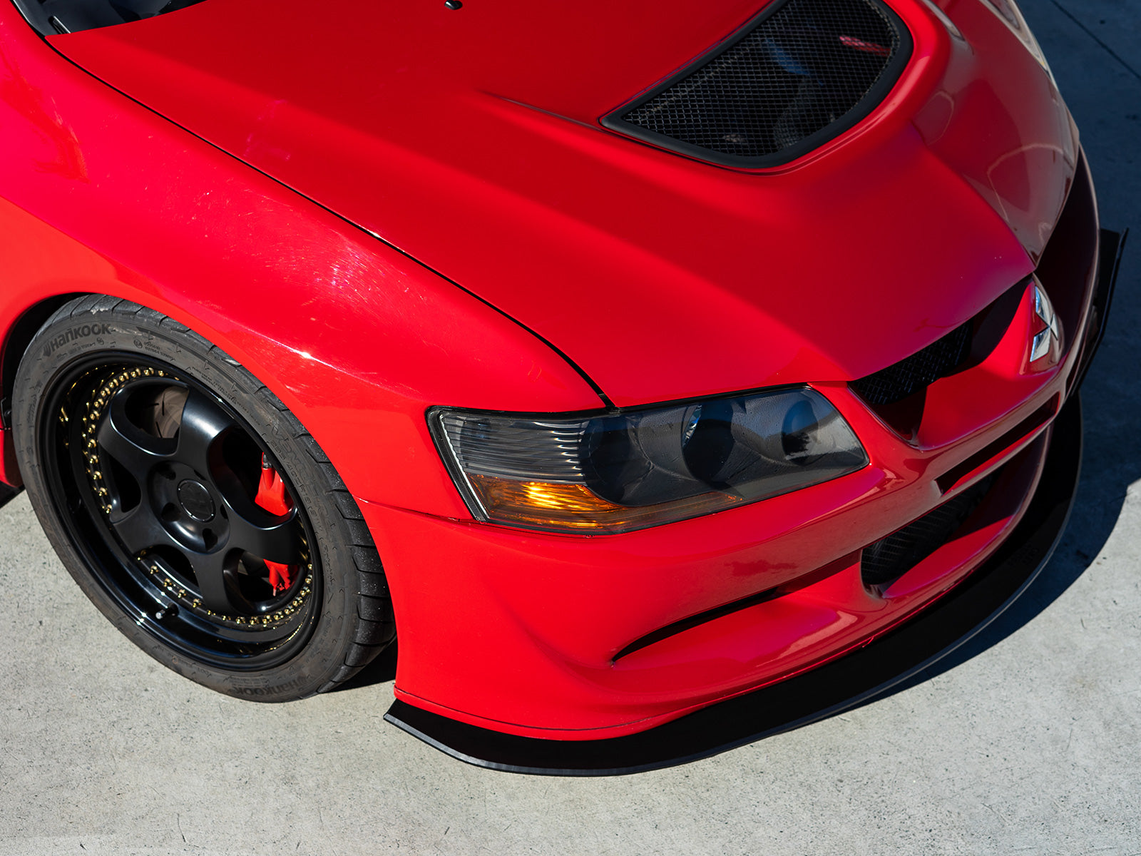Project Aero Mitsubishi Evo 8 Front Splitter Lip, subtle in design complimenting the OEM original bumper.