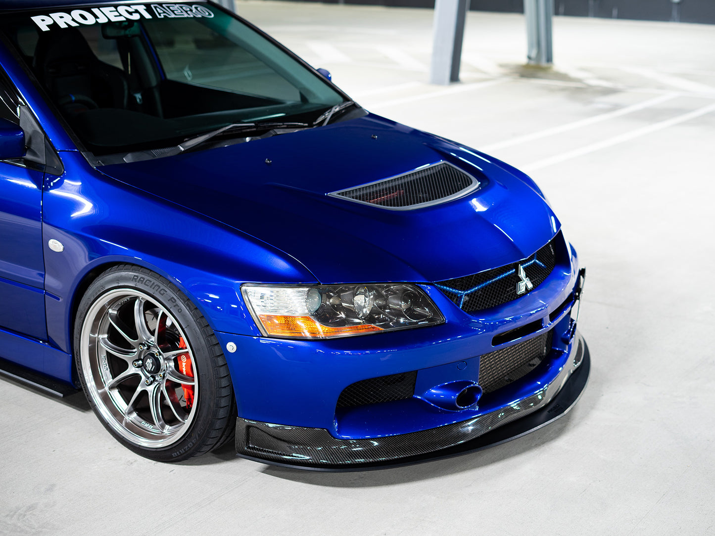 The Project Aero Evo 9 front splitter lip is the perfect lip for any Evo 9, complimenting the front bumper, this is a perfect piece for any Evo 9