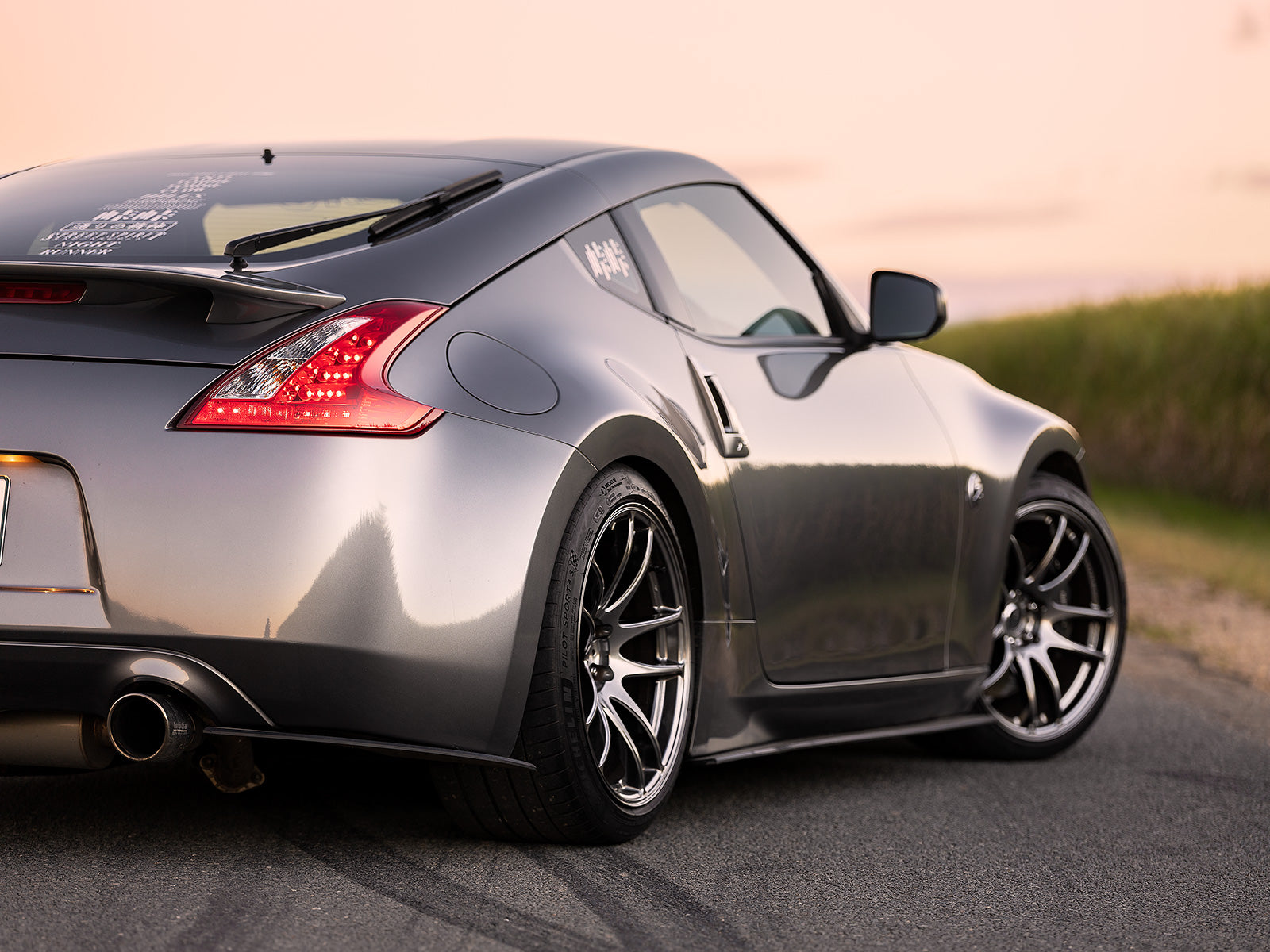 370z Project Aero rear spats/pods compliment the OEM factory rear bumper for a more subtle yet aggressive look