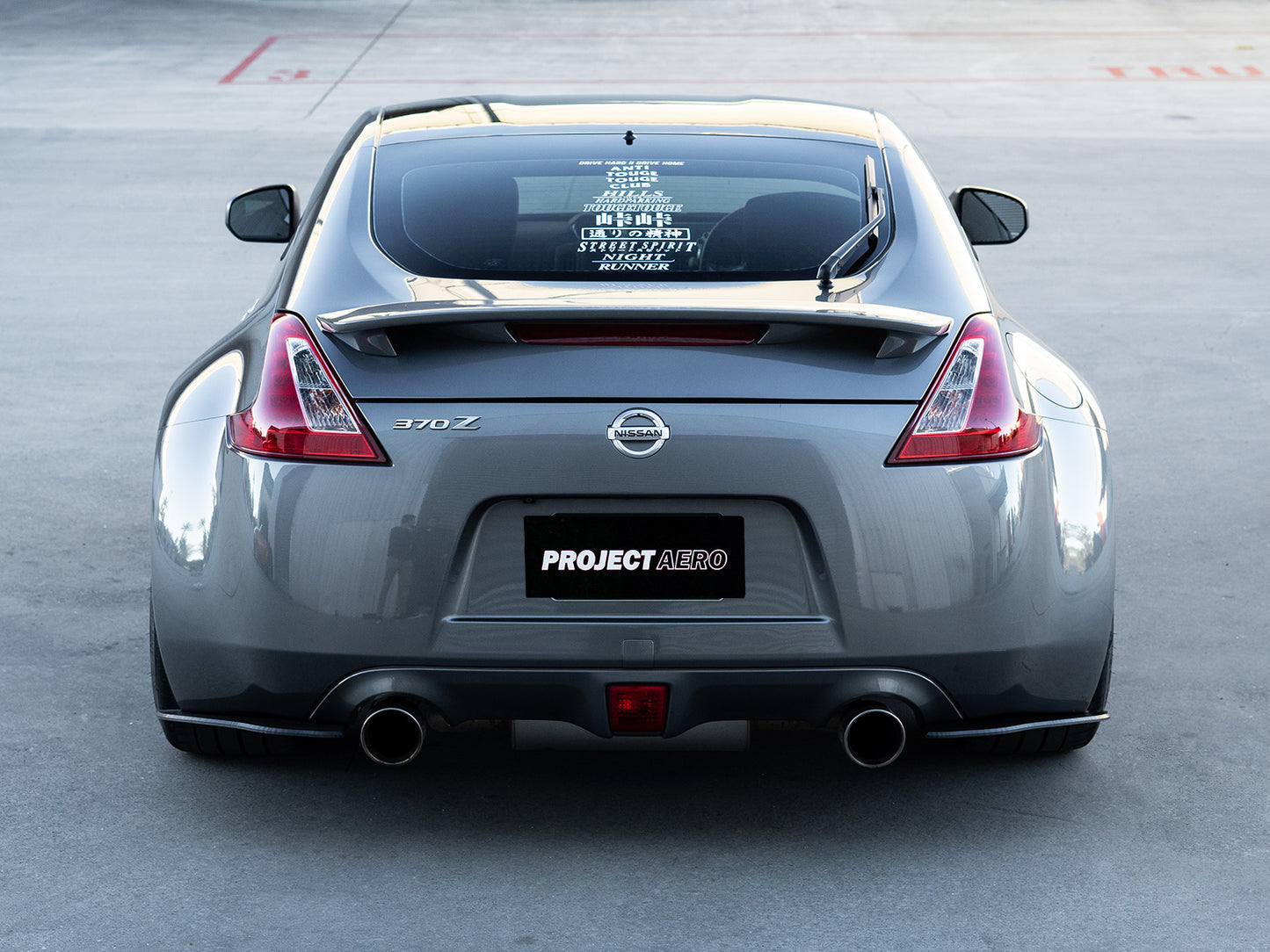 370z Project Aero rear spats/pods compliment the OEM factory rear bumper for a more subtle yet aggressive look