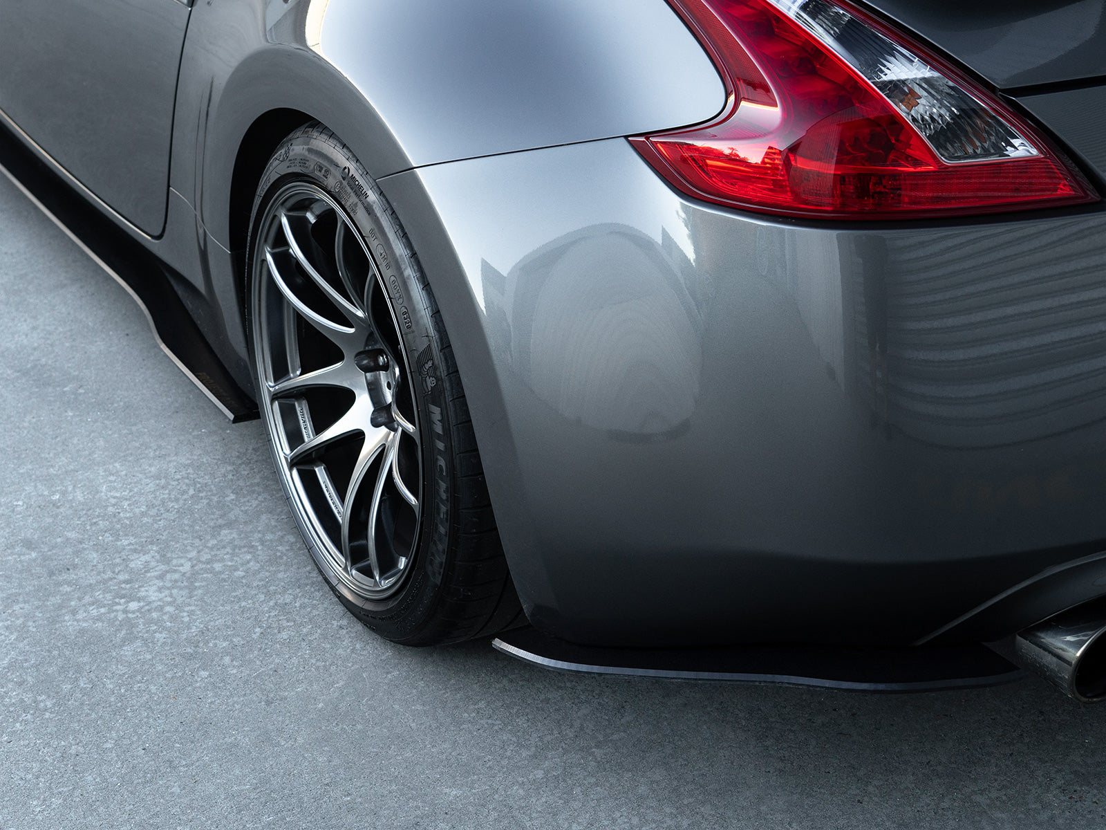 370z Project Aero rear spats/pods compliment the OEM factory rear bumper for a more subtle yet aggressive look